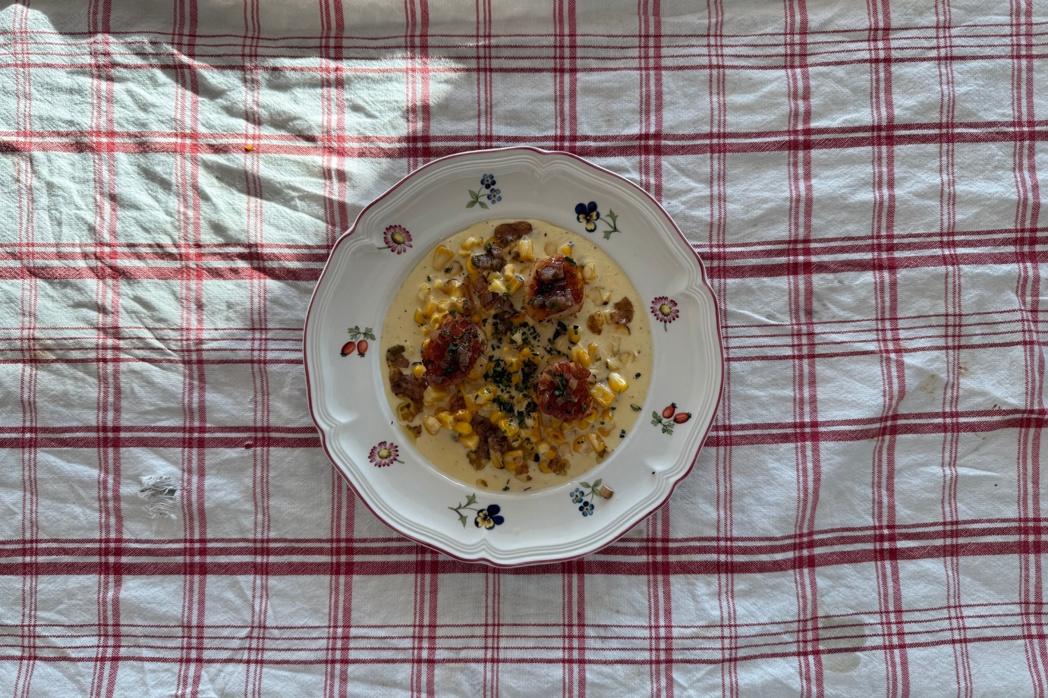 Sotad Pilgrimsmussla med Stuvad Majs